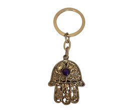 Sleutelhanger Hand van Fatima met paars steentje Sleutelhanger Hand van Fatima met paars steentje